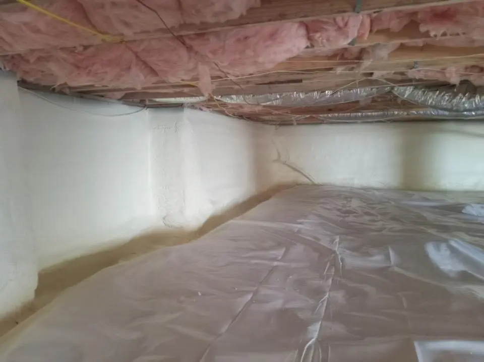 Crawl space encapsulation with closed-cell spray foam for Commercial Roof Restoration in Kiryas Joel